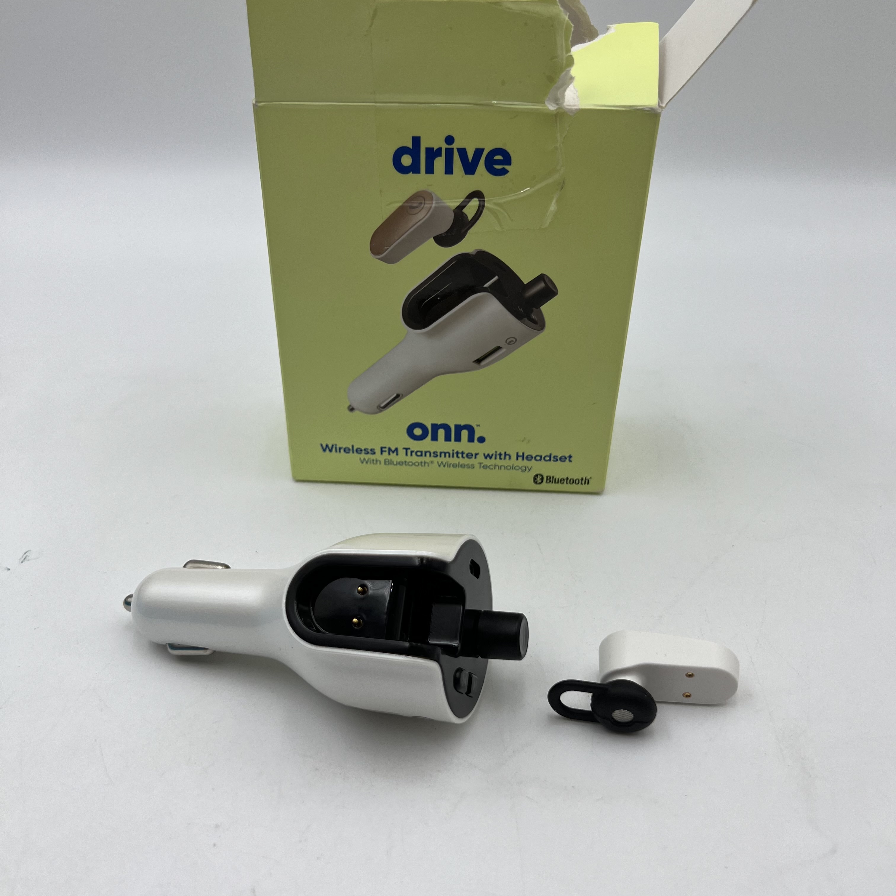 onn. Bluetooth FM Transmitter with Wireless Earphone - Photo 2